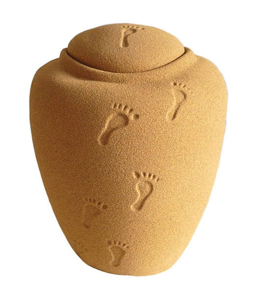 Beach Comber Biodegradable Urn tan with footprints.