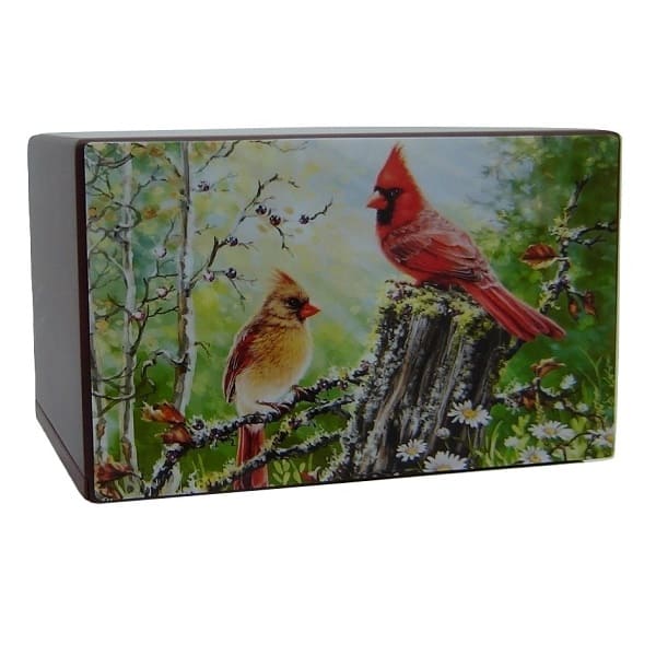 Two Cardinals in the woods on wooden urn for ashes